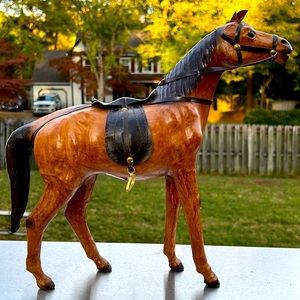 Vintage leather horse statue with saddle